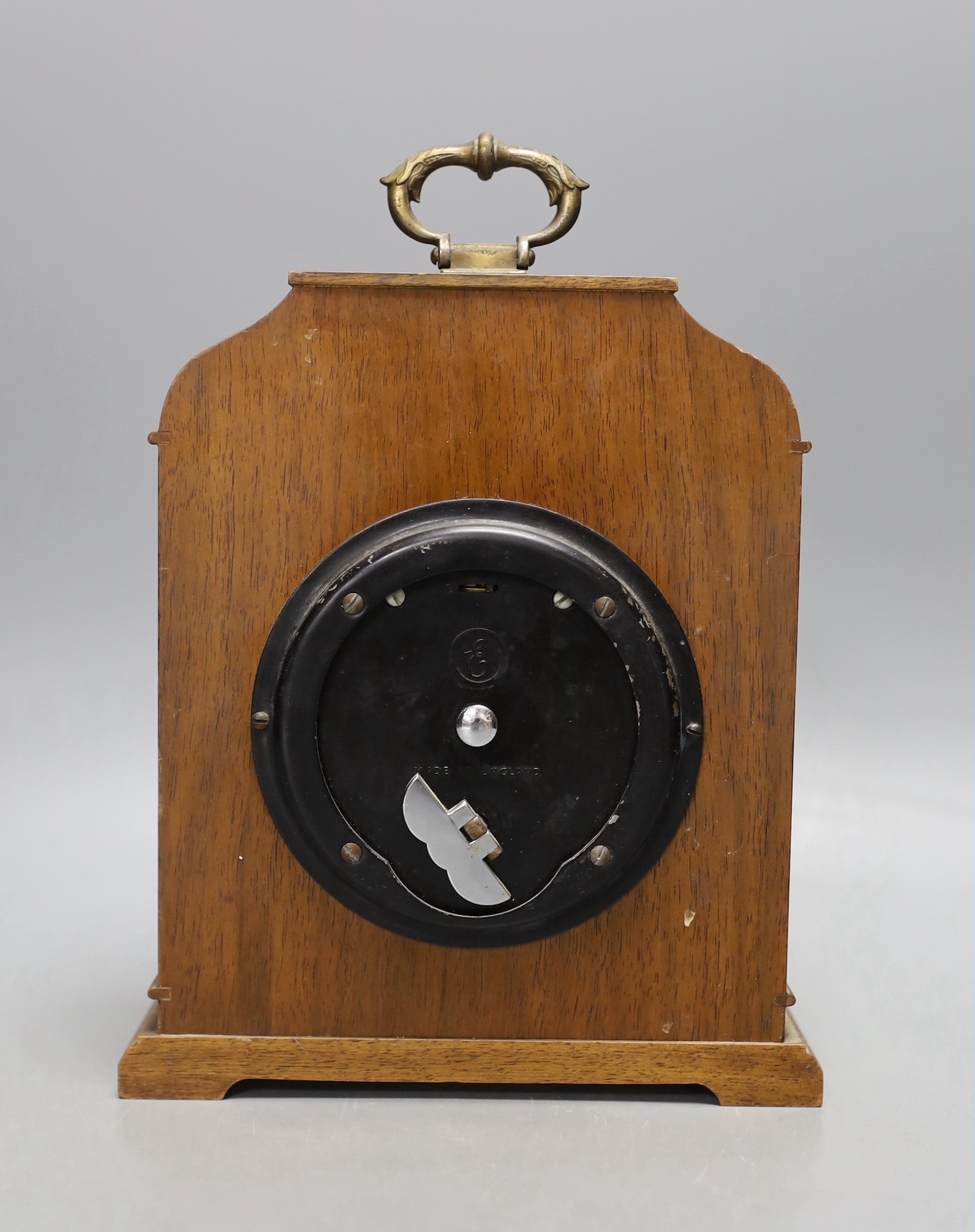 An Elliot walnut mantle timepiece 23cm